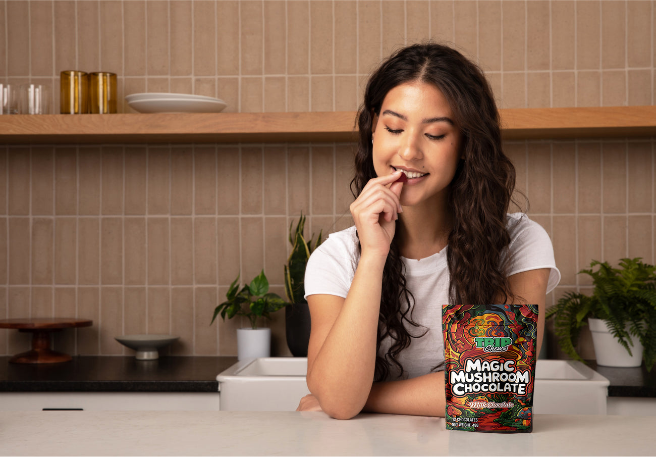 woman eating a trip chew magic mushroom chocolate