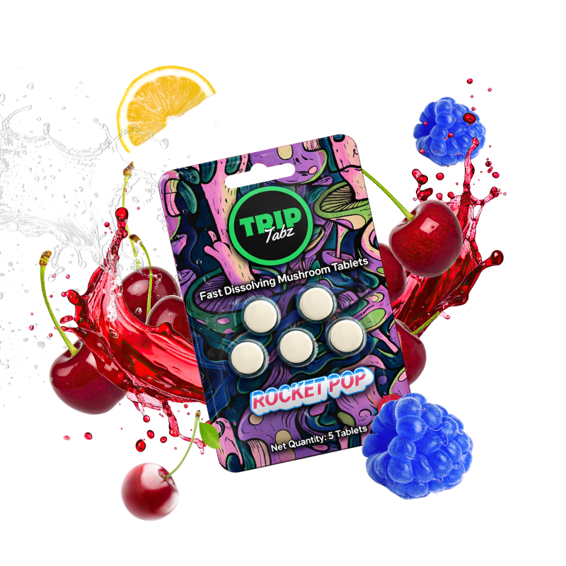 TRIP Tabz Rocket Pop fast dissolving mushroom tablets packaging with colorful splashes of fruit and a lemon slice on a white background.