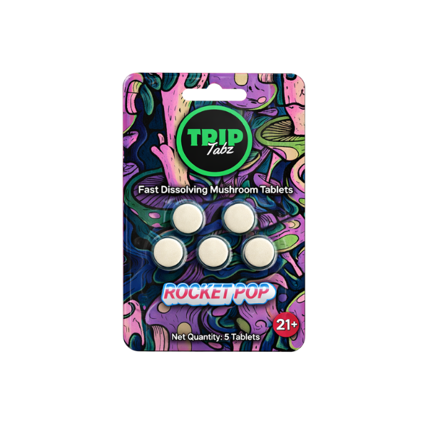 Pack of fast-dissolving mushroom tablets with colorful packaging on a white background